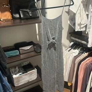 Black and white midi body con dress with keyhole cut out on stomach